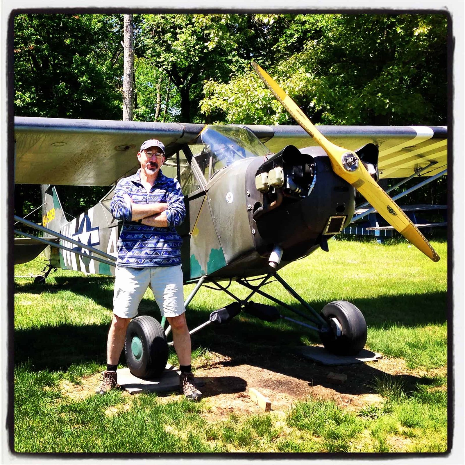 John Woike learning to fly a Piper Cub airplane